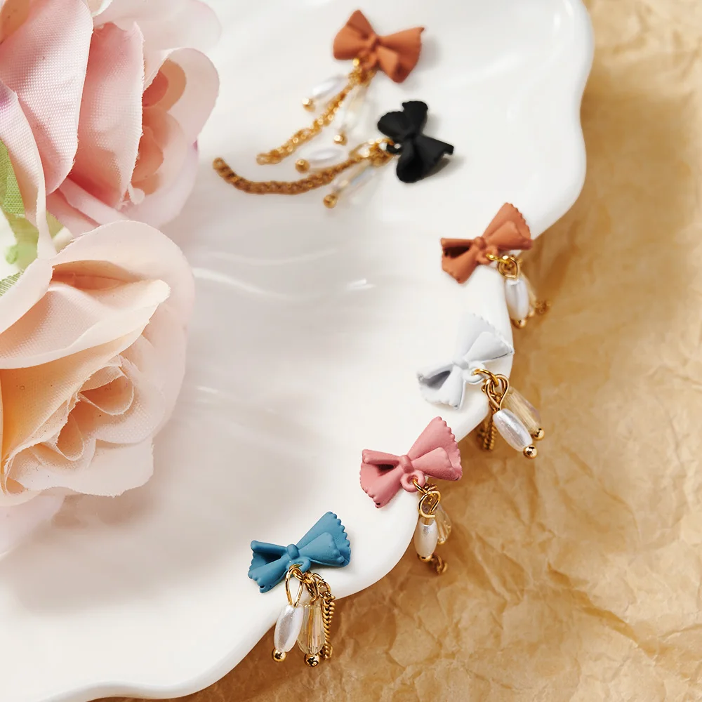 10pcs 3D Bowknot Kovové Visieť Reťazca Nail Art Šperky Japonci Pearl Prívesok na Nechty, Ozdoby Crystal Manikúra Kamienkami Čaro Obrázok 1
